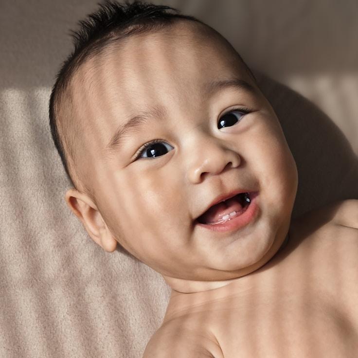 Kaveri Mehta, Lead Design Curator at Simple Growth Path Way, reviewing corporate floral arrangements